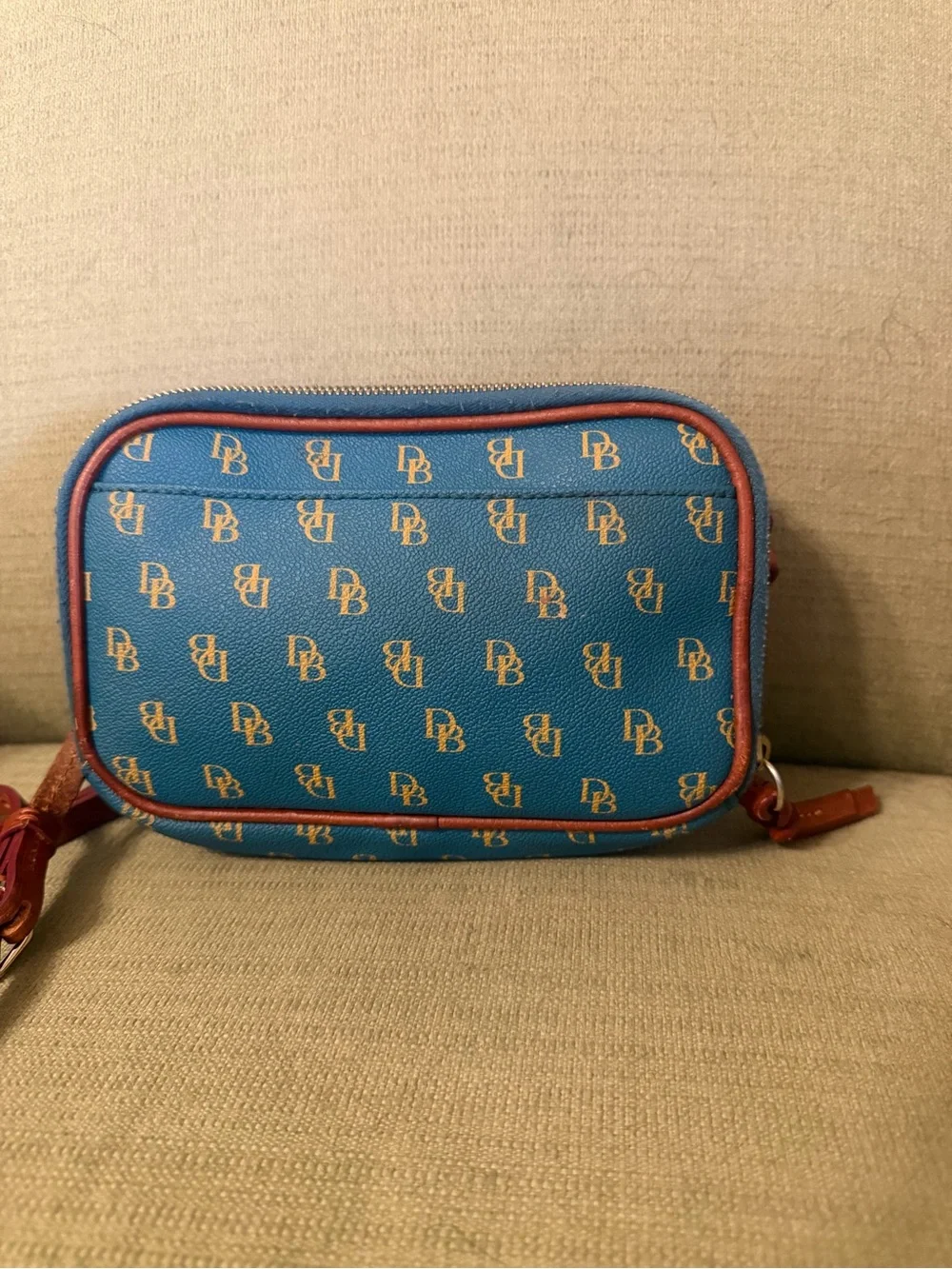 Dooney & Bourke measures 5”